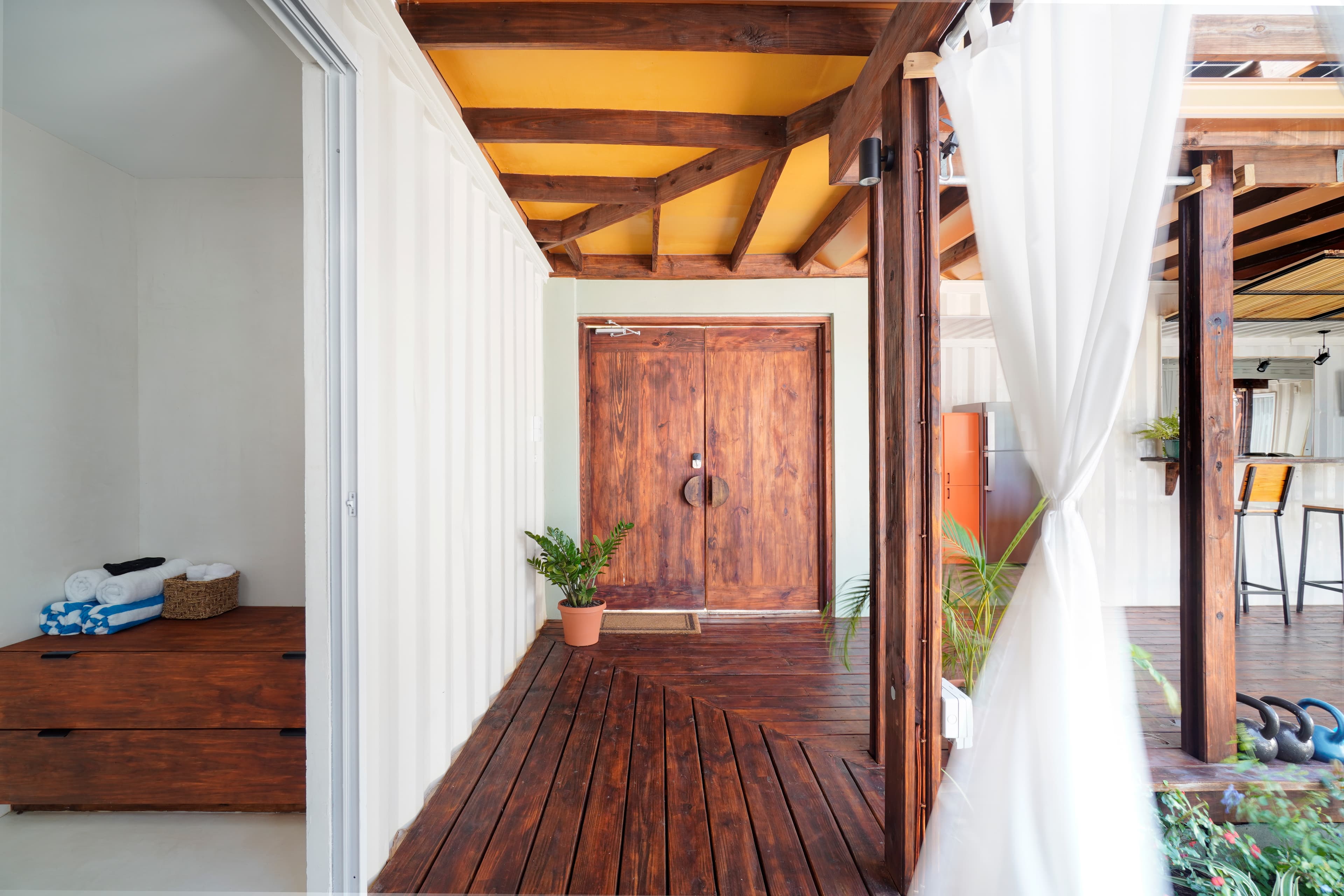 Corten Villa's distinctive weathered corten steel exterior and modern shipping container architecture in Grenada