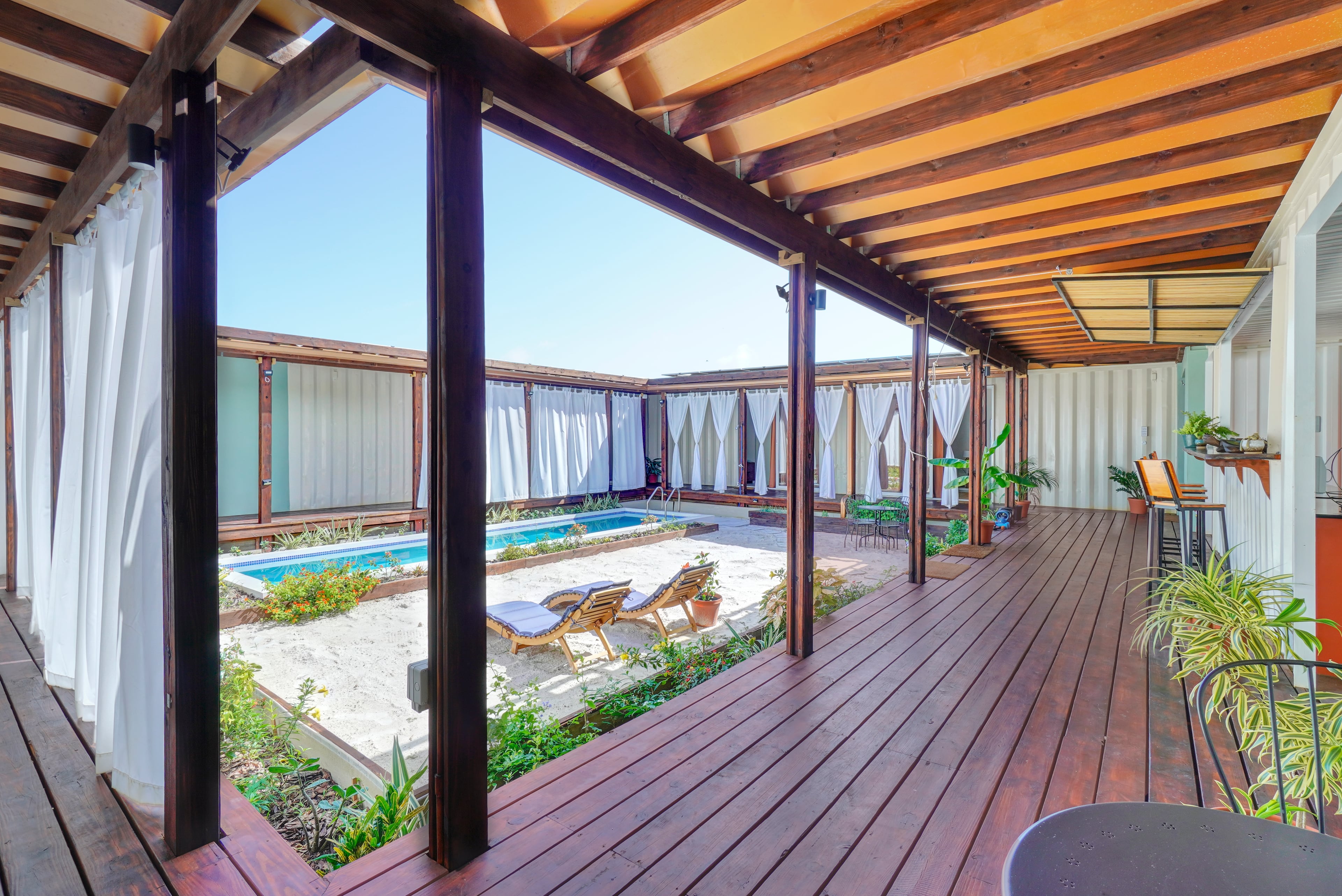 Corten Villa courtyard with private saltwater pool and tropical garden in Grenada
