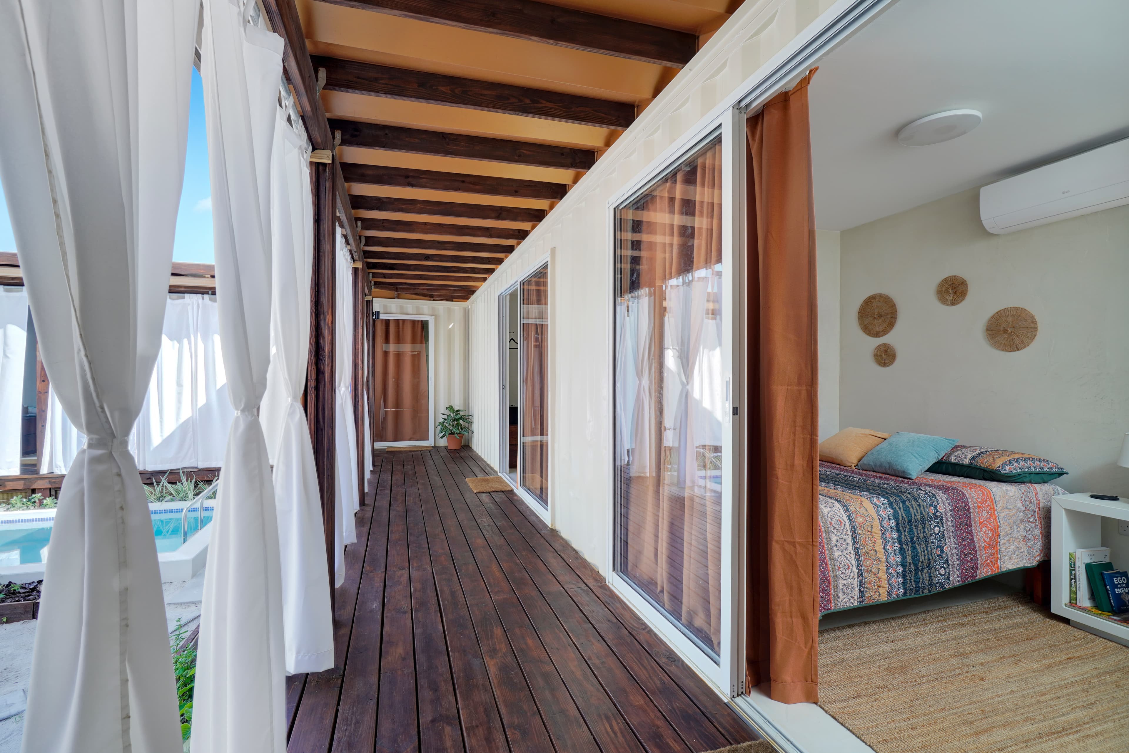 Bedroom opens to the pool